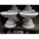 A pair of contemporary low two sectional bird baths of circular form with moulded rims and