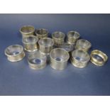 Collection of ten silver napkin rings, 7.5 oz approx together with three silver plated examples (13)