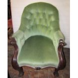A Victorian mahogany drawing room chair upholstered in green draylon with buttoned framework and