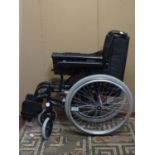 A Invacare folding wheelchair