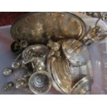 A box containing a large collection of silver plated items to include entree dishes, candelabra,