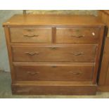 A vintage stripped pine kitchen cabinet, partially enclosed by a pair of rectangular glazed panelled