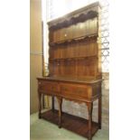 A good quality oak cottage dresser in the Georgian style with recessed oak open plate rack with