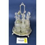 Silver plate and cut glass bottle cruet comprising seven glass vessels, together with a further rope