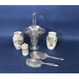 A mixed lot comprising a silver plated vase with wavy handle and diaper pierced sides, 40 cm high,
