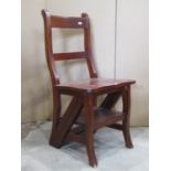 A reproduction hardwood bar back metamorphic chair/steps with swept supports