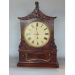 Regency mahogany pagoda bracket type clock, the 8 inch enamel dial painted with Roman numerals,