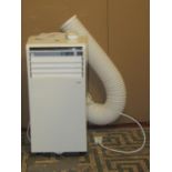 A Challenge electric air conditioning unit with remote control extraction tube and instruction