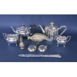 A mixed collection of silver plate to include a Regency serpentine teapot, a further three piece tea