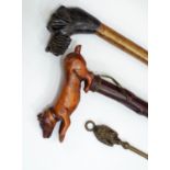 19th century walking stick, the handle in the form of a playful dog, further walking stick in the