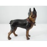 A cast iron terrier with original painted detail, 22cm high