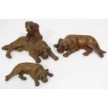 Three late 19th century Austrian carved timber group probably by the same hand, (dog and puppy AF)