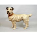 A ceramic figure of a standing terrier, the collar patriotically engraved 'I belong to the king,'