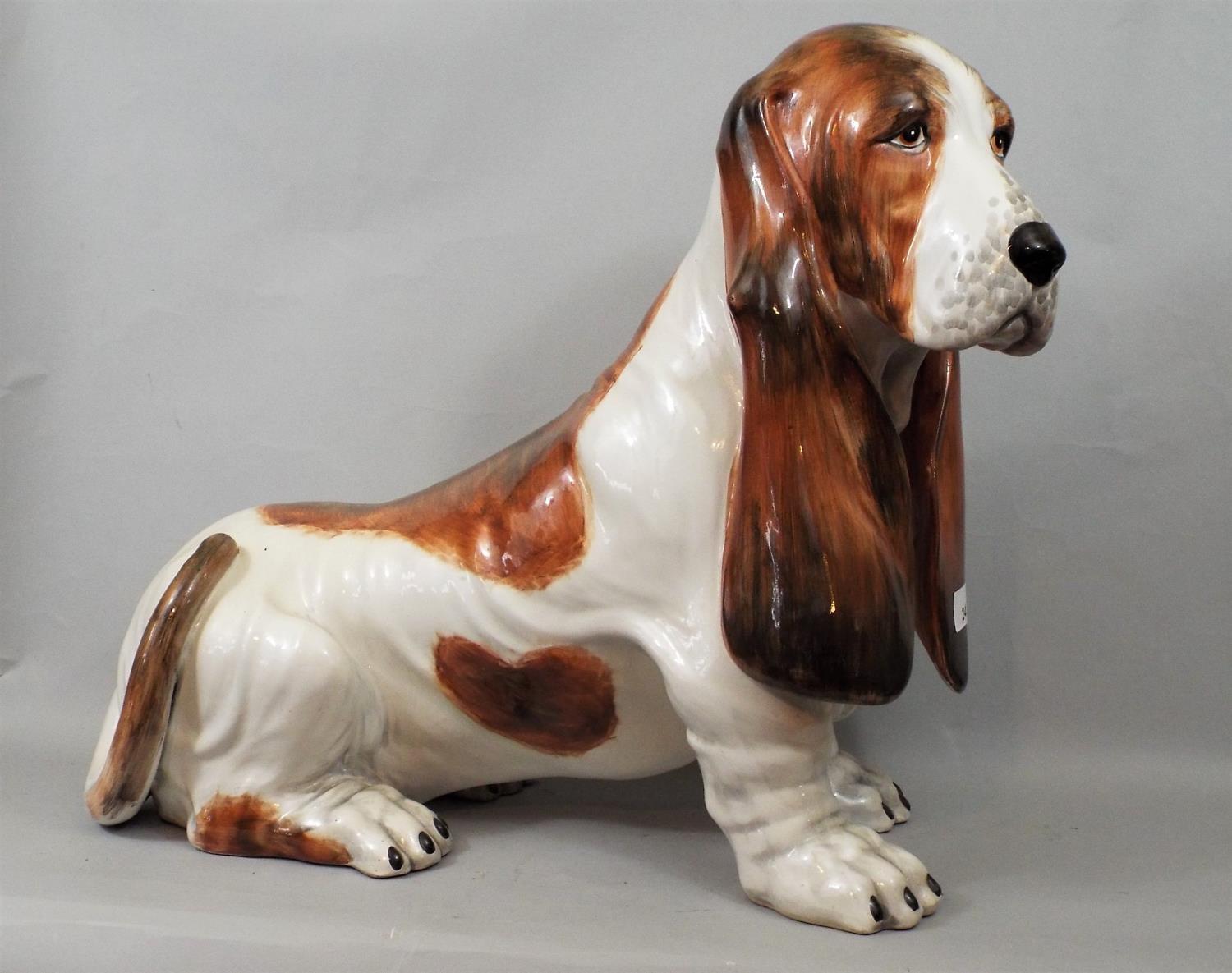 Pottery figure of a basset hound, 43 cm in height