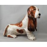 Pottery figure of a basset hound, 43 cm in height
