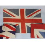 3 vintage Union flags together with a quantity of flag cloth (long uncut lengths) in Tricolour. (