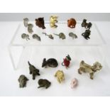 A miscellaneous collection of small creatures, mainly rats, including a small timber dog, (18