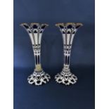 A pair of Bohemian glass flared vases, the blue glass with white aesthetic overlay, 32 cm high (AF)