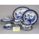 A quantity of Booth's Real Old Willow pattern blue and white printed dinnerwares comprising a pair