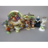 A collection of ceramic birds including Royal Worcester blue tits 3375, thrush 3324, wren 3198 and