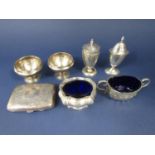 Mixed collection of silver comprising two peppers, two blue glass lined salts, further pair of salts