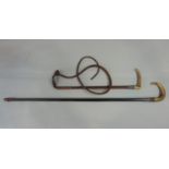 Silver collared horn handle plaited leather riding crop together with a further crooked horn handled