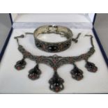 Decorative silver jet and coral demi-parure comprising drop necklace and bangle, cased (2)