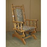 A child's size American rocking chair with turned beechwood frame