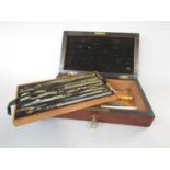 19th century rosewood cased two tier stationery set containing various brass and steel tools, the