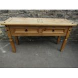 A contemporary pine side/serving table with metal fittings (probably Mexican), the panelled top over