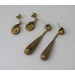 Two pairs of 9ct earrings; a pair of tapered drops with brushed finish and a further pair set with