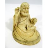 Meiji Period - Ivory Okimono of a seated man holding a small fruit above a rat scrambling up his