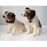 Two Winstanley models of terrier in similar pose, 32cm max