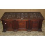 A multi-panelled oak blanket box/coffer with architectural mouldings, 126 cm long x 56 cm wide x