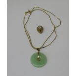 Eastern style 14k pendant necklace with green hardstone bi-disc pendant, possibly jade, also with
