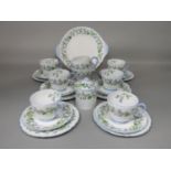 A six place Shelley Harebell pattern tea service including milk jug, sugar bowl, six preserve