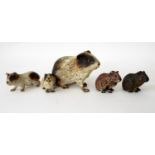 A charming group of cold painted bronze guinea pigs, some stamped Geschutzt, the largest 7cm long