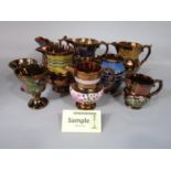 A quantity of 19th century and later ceramics including a number of copper lustre jugs of various