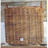 Large wicker twin handled log/wash basket, 50 cm high including handles