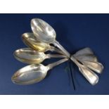 Matched set of four fiddle and thread silver dessert spoons, various makers and dates, 6.5 oz approx