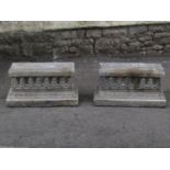 A pair of composition stone capitals/possibly plinths of Eastern origin with repeating foliate