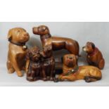 Five carved timber models of dogs, 19 cm and smaller