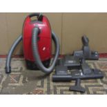 A Miele cat and dog TT2000 electric vacuum cleaner and attachments