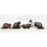 Four oriental bronze figures of rats, 11cm high max