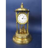 A good gilt brass anniversary/400 day torsion type mantel clock, with architectural case work