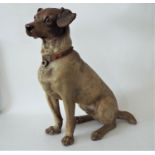 A good late 19th century terracotta model of a seated terrier, with original naturalistic painted