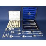 Cased set of six silver teaspoons together with a further set of eight silver teaspoons with fancy