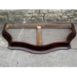 A 19th century walnut veneered single corona or pelmet with serpentine outline 142 cm wide x 97 cm