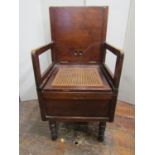 19th century campaign commode with folding framework and detachable legs, folding backs enclosing