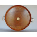 Interesting Edwardian twin handle tray with raised rim centrally fitted with a white metal panel